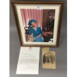 A framed photograph of the Queen Mother and a typed letter signed by Angela Oswald