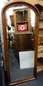 A full length Victorian bevelled mirror