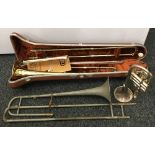 A cased Olds Ambassador trombone, a trumpet, etc.
