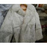 A collection of various vintage furs and fur coats