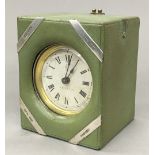 A silver mounted leather cased desk clock