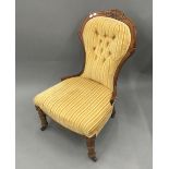 A Victorian yellow upholstered button back nursing chair