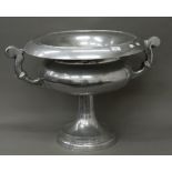 A large aluminium urn