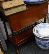 A Victorian walnut twin drop flap side table with undertier