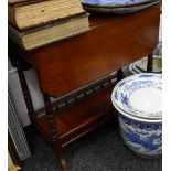 A Victorian walnut twin drop flap side table with undertier