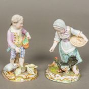 A pair of 19th century Meissen porcelain figurines, one formed as a young boy feeding geese,