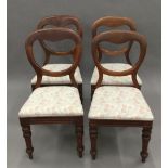 A set of four Victorian mahogany balloon back chairs