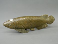 A large bronze model of a fish