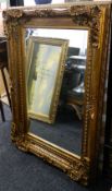 A gilt framed mirror