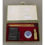 A boxed Chinese calligraphy set