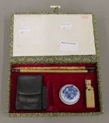 A boxed Chinese calligraphy set