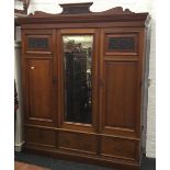 A Victorian Maple & Co walnut wardrobe