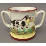 A 19th century Staffordshire frog mug