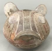 A South American pottery jaguar mask