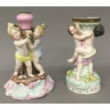 Two 19th century porcelain figural groups. 20.5 cm high and 19 cm high respectively.