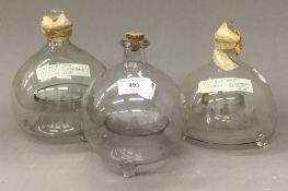 Three vintage glass wasp traps