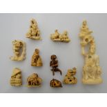A collection of 19th century carved ivory netsukes and an okimono