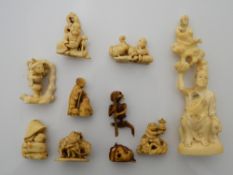 A collection of 19th century carved ivory netsukes and an okimono