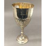 A silver trophy goblet (7.