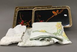 A lacquered tray and a small quantity of linen