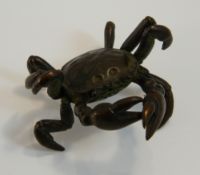 A bronze model of a crab