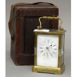 A 19th century brass case carriage clock housed in original travelling case