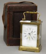 A 19th century brass case carriage clock housed in original travelling case