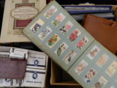 A large collection of cigarette cards