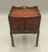 A George III style mahogany bedside cupboard