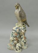 A 19th century Japanese pottery model of a falcon