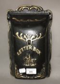 A cast iron letter box