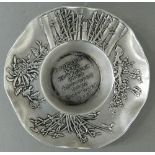 A Chinese white metal shallow dish