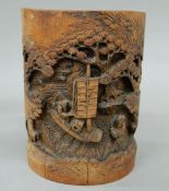 A Chinese carved bamboo brush pot