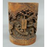 A Chinese carved bamboo brush pot