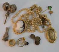 A quantity of costume jewellery, a silver rattle, etc.