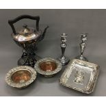 A quantity of silver plate, including a spirit kettle, bottle coasters, etc.