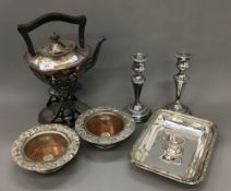 A quantity of silver plate, including a spirit kettle, bottle coasters, etc.