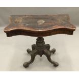 A Victorian burr walnut Serpentine card table