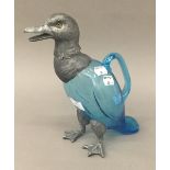 A vintage French blue glass claret jug formed as a duck