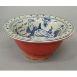 A Chinese red and blue porcelain bowl
