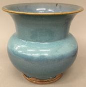 A Chinese Jun Ware type blue glazed vase. 20.5 cm high; 21 cm diameter.