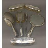 A quantity of silver dressing table items.