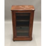 A Victorian walnut glazed side cabinet and a pot cupboard