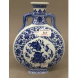 A Chinese porcelain blue and white moon flask. 9.75 cm high.
