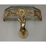 A marble topped brass wall mounted console table