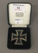A reproduction pin back 1939 Iron cross