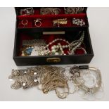 A jewellery box containing costume jewellery