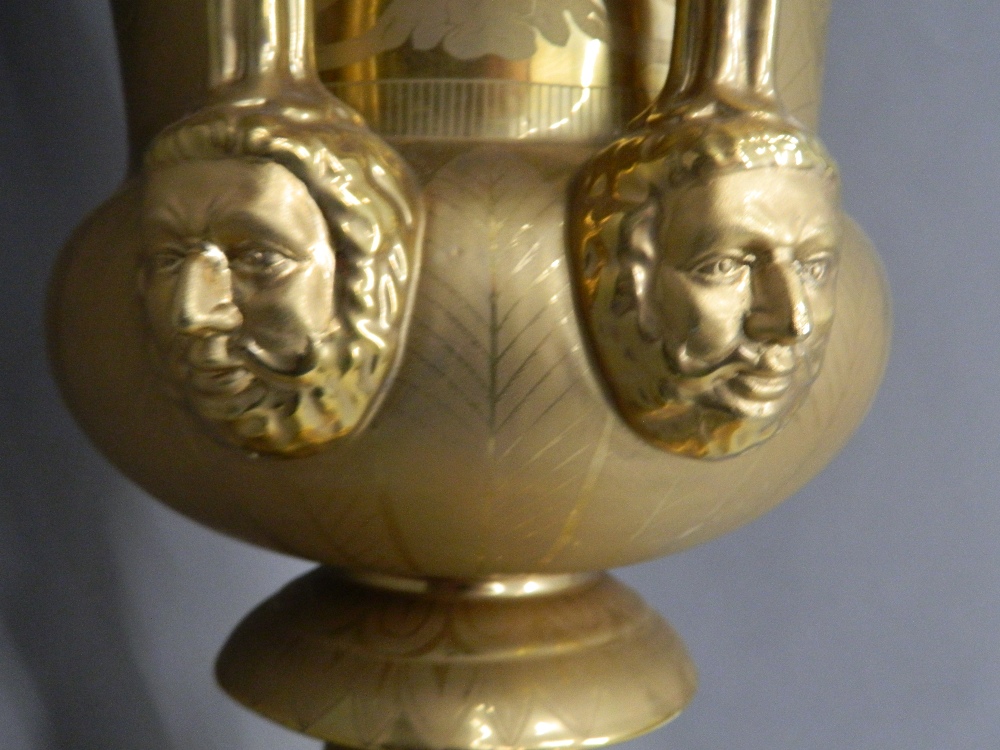 A Continental porcelain twin handled urn vase Gilt decorated enclosing a portrait roundel, - Image 4 of 4