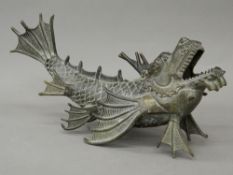 A bronze model of a dragon fish. 33 cm long; 17 cm high.