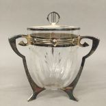 A WMF silver plate mounted cut glass biscuit barrel